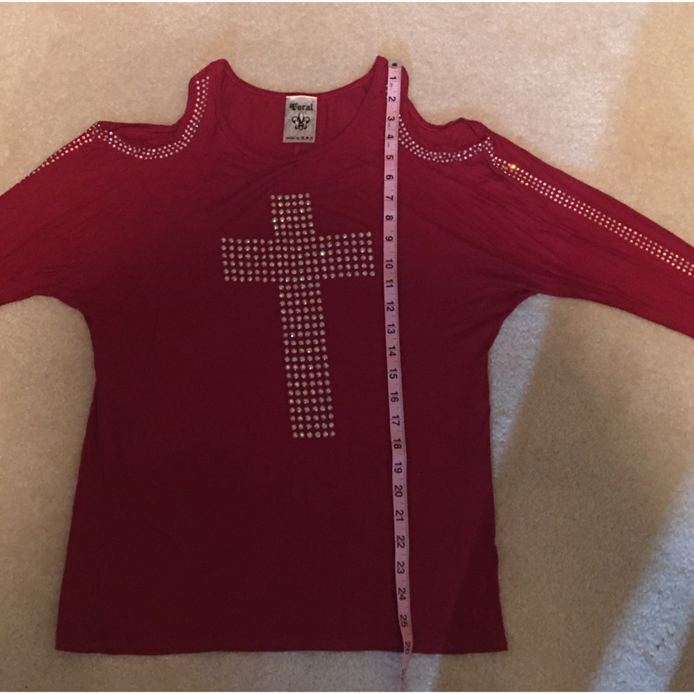 Vocal Top with sequins. Slight batwing style sleeve. Cold shoulder cut outs.